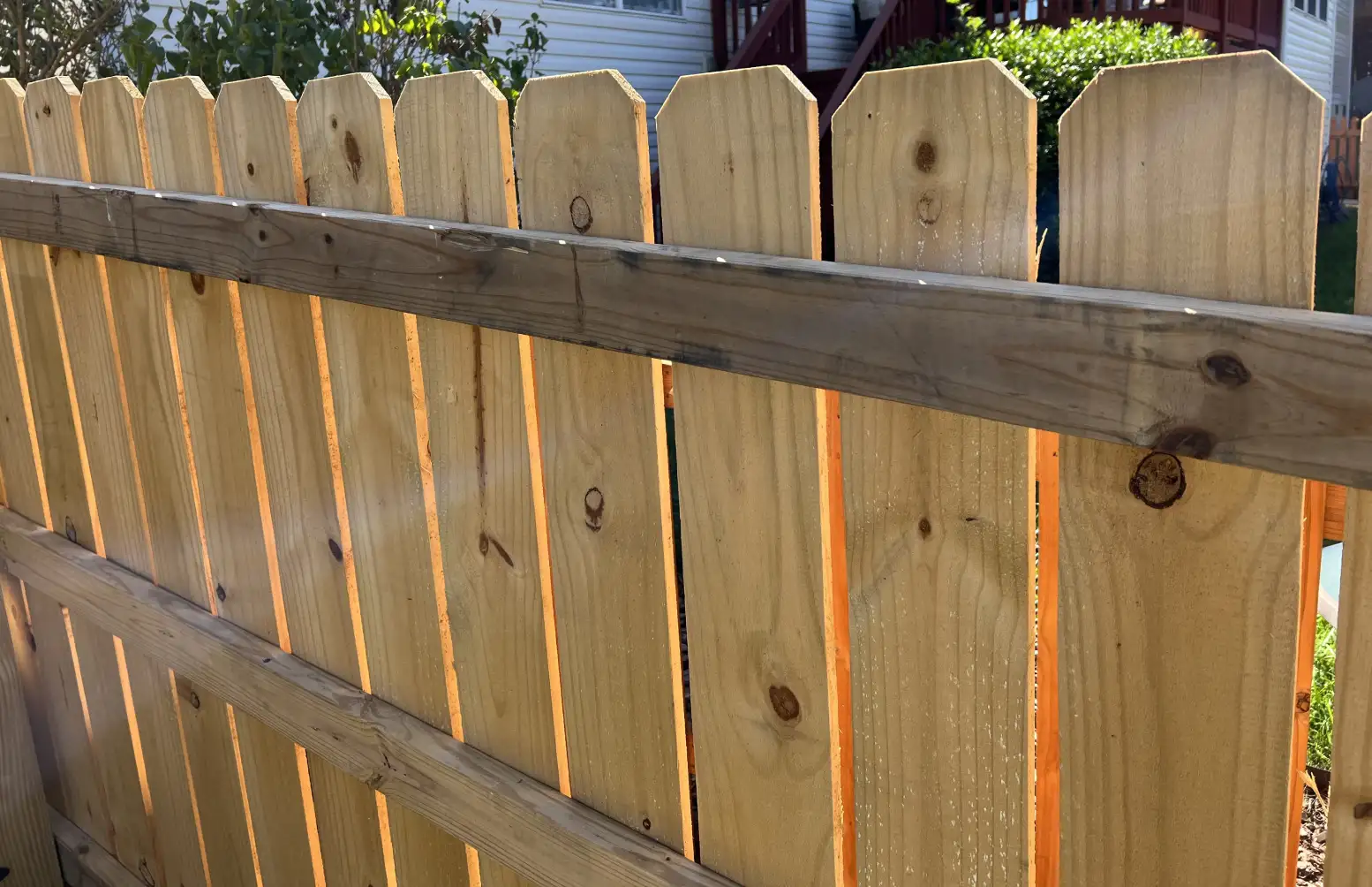 A wooden fence with no one in it.